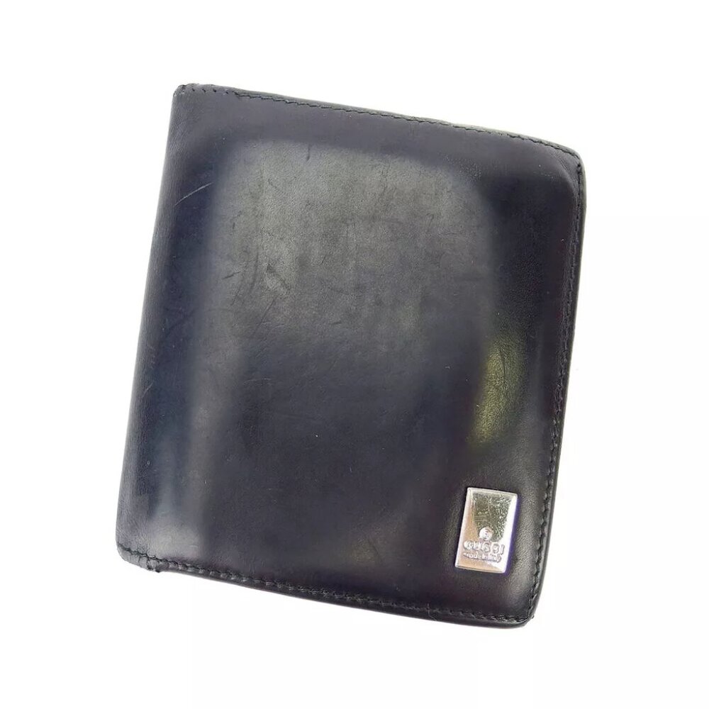 AUTHENTICITY GUARANTEED GUCCI two-fold wallet logo plate leather USED
